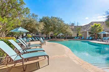 Relaxing swimming pool with sundeck
